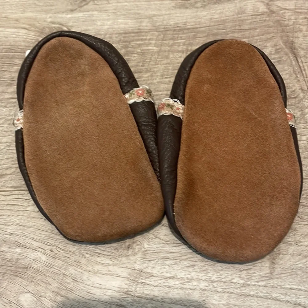 Bundle of soft baby moccasins/crib shoes